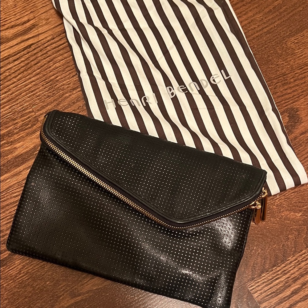 Henri Bendel Perforated Black Clutch